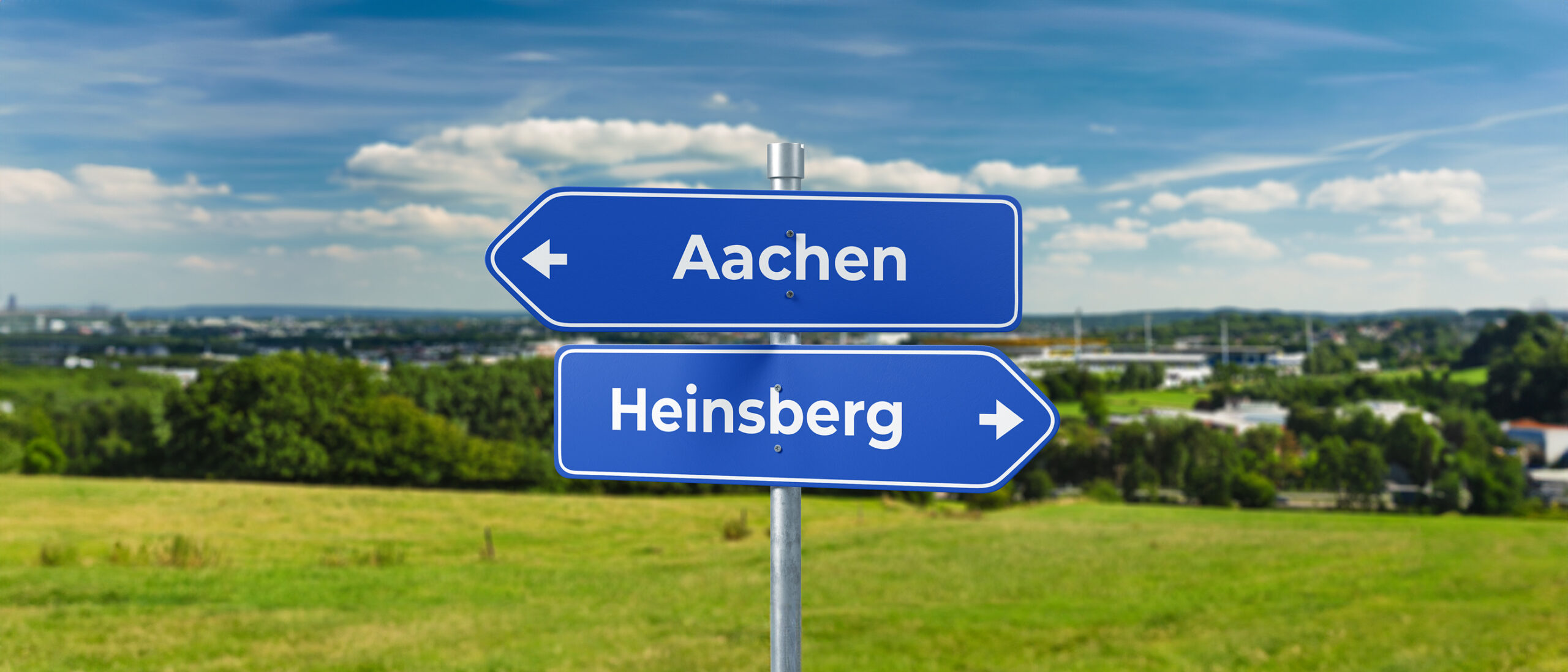 Symbolbild eines Ortschildes für unsere zwei Standorte in Aachen und Heinsberg.